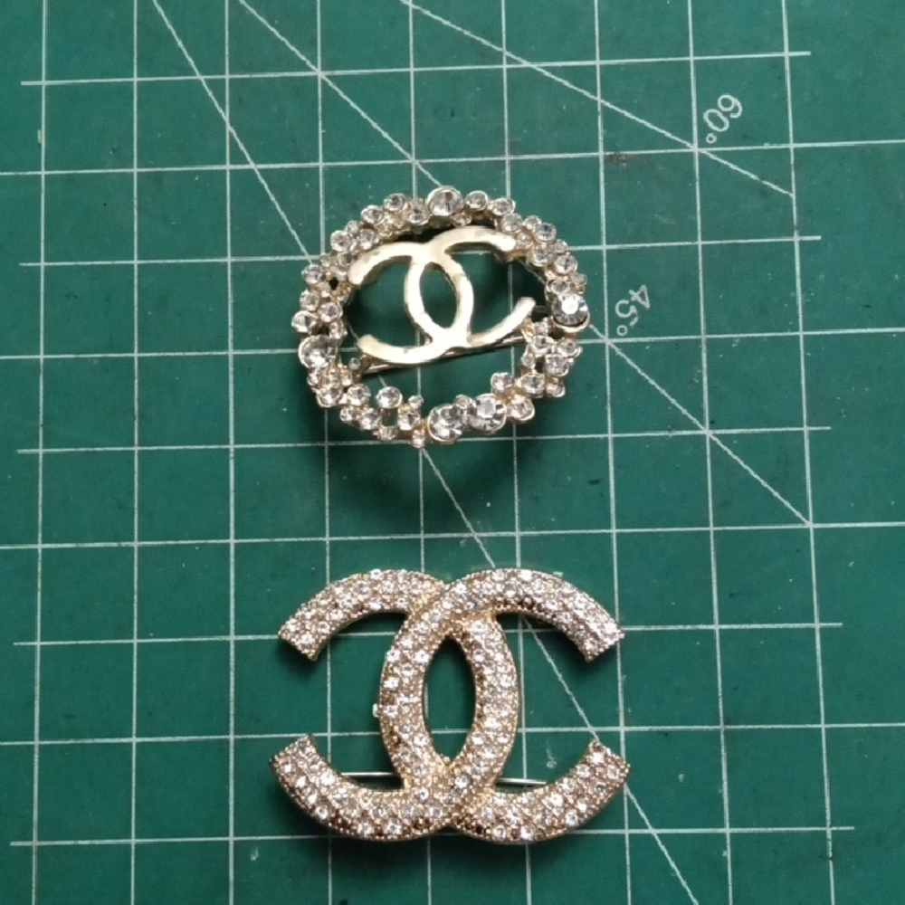 Lot Of 2 Tribute Double CC Broches Good Condition Goldtone Crystal